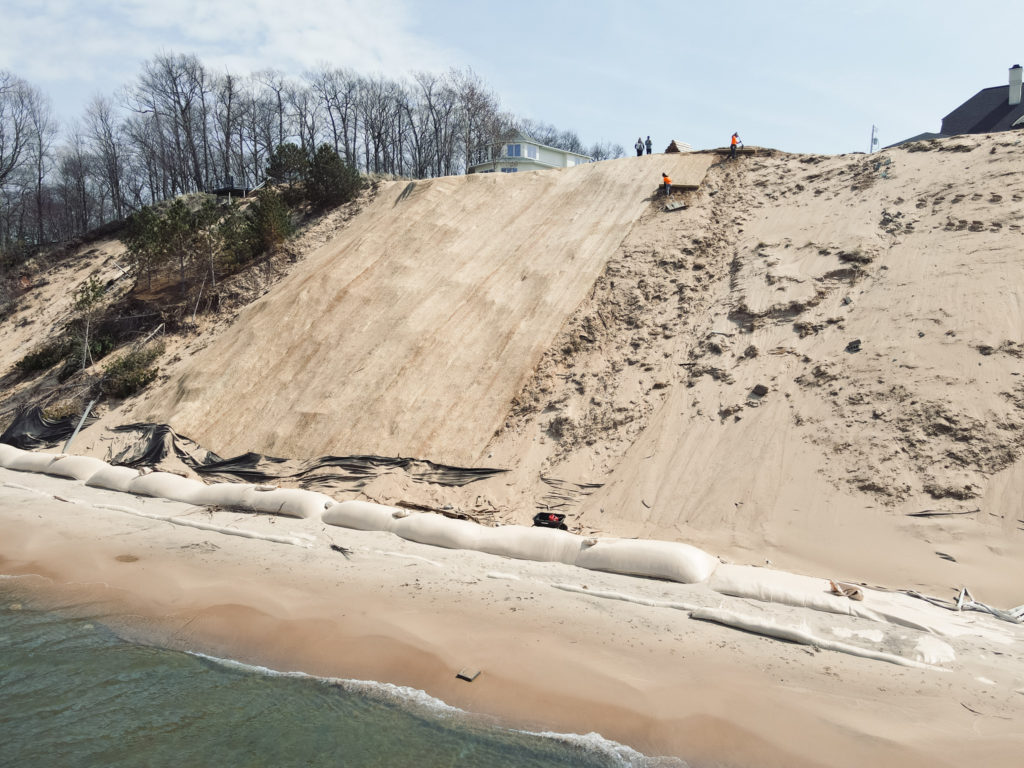 Aerial view of erosion blanket covering sand dune