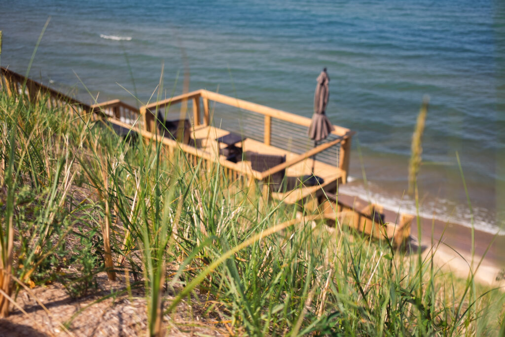 Dune grass secured with an erosion control blanket for a steep dune on Lake Michigan's shoreline.